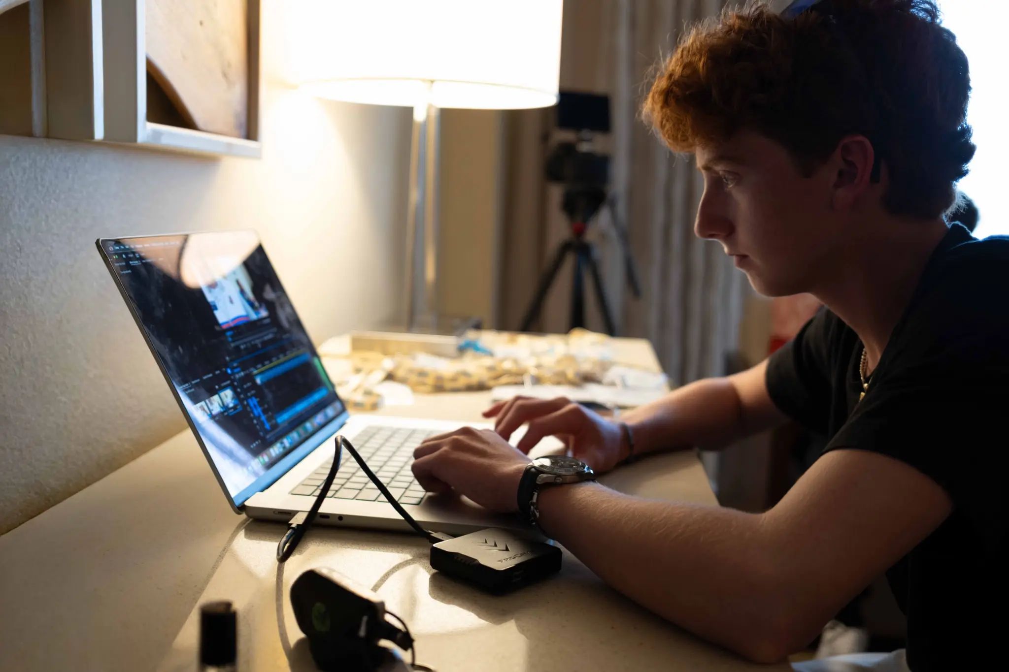 Evan editing video in post-production